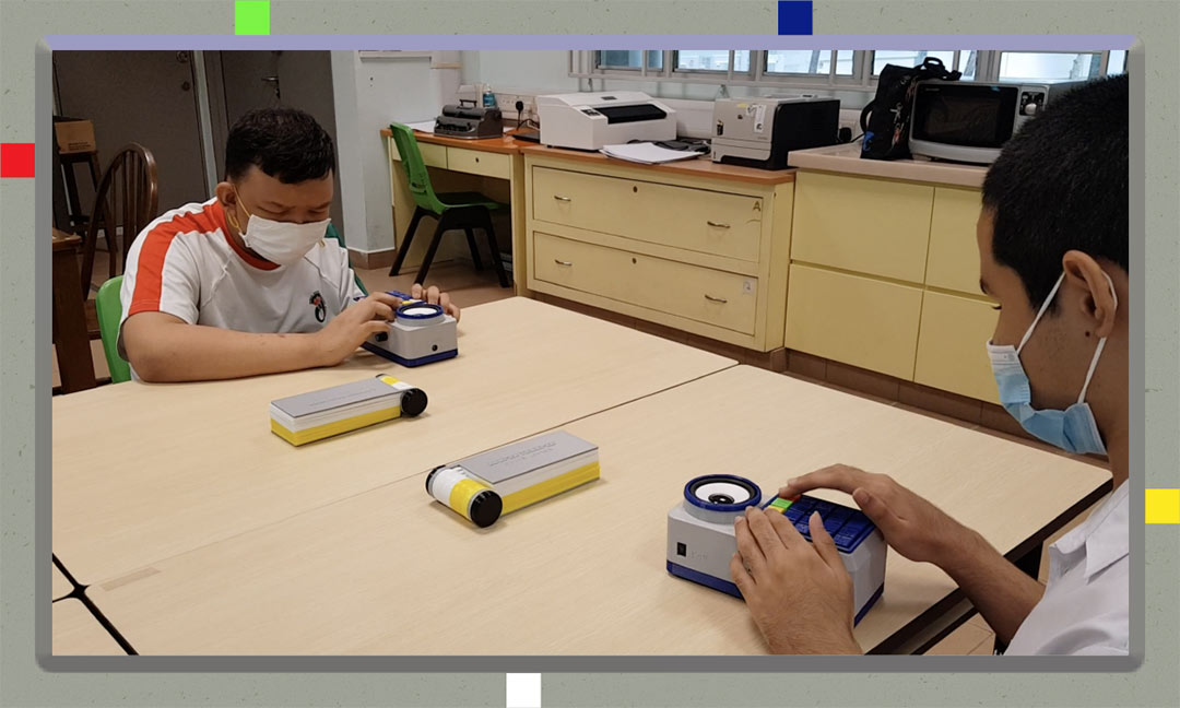Two students from Ahmad Ibrahim Secondary School trying out 'Looper Trouper'.