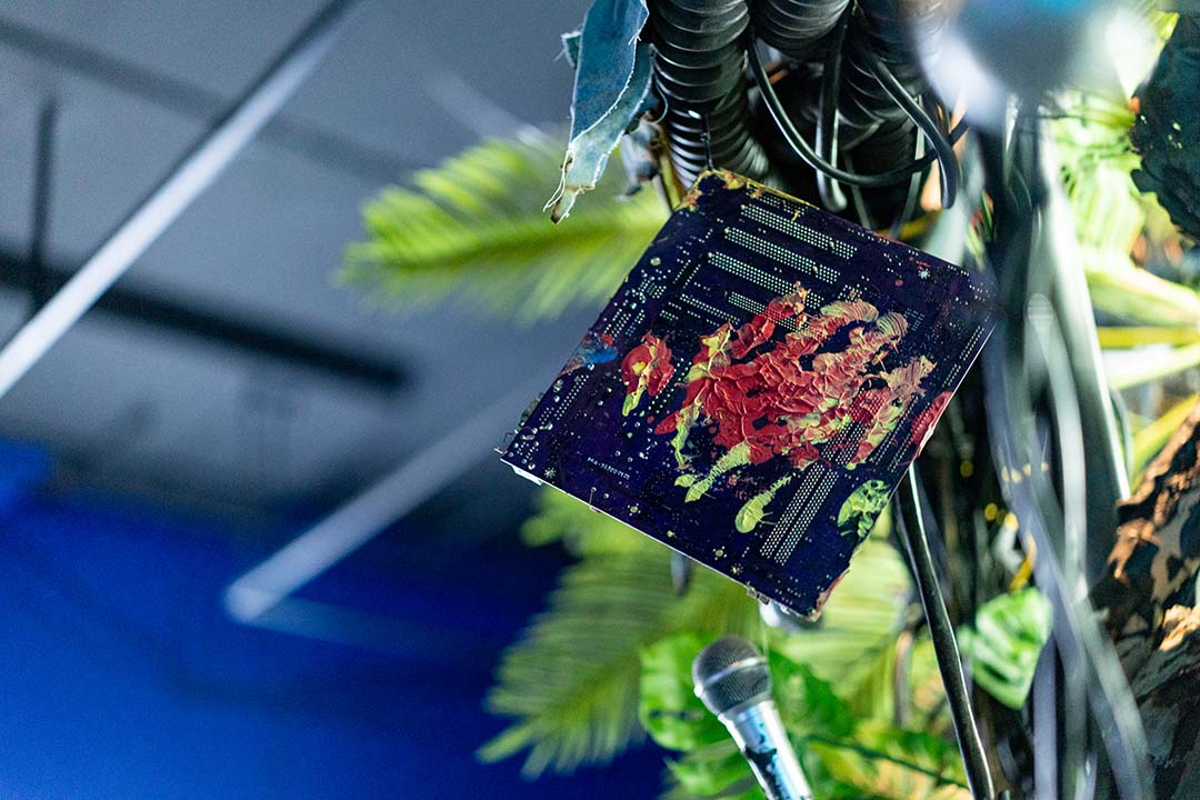 An e-waste component on the naga and a room painted in a blue hue.