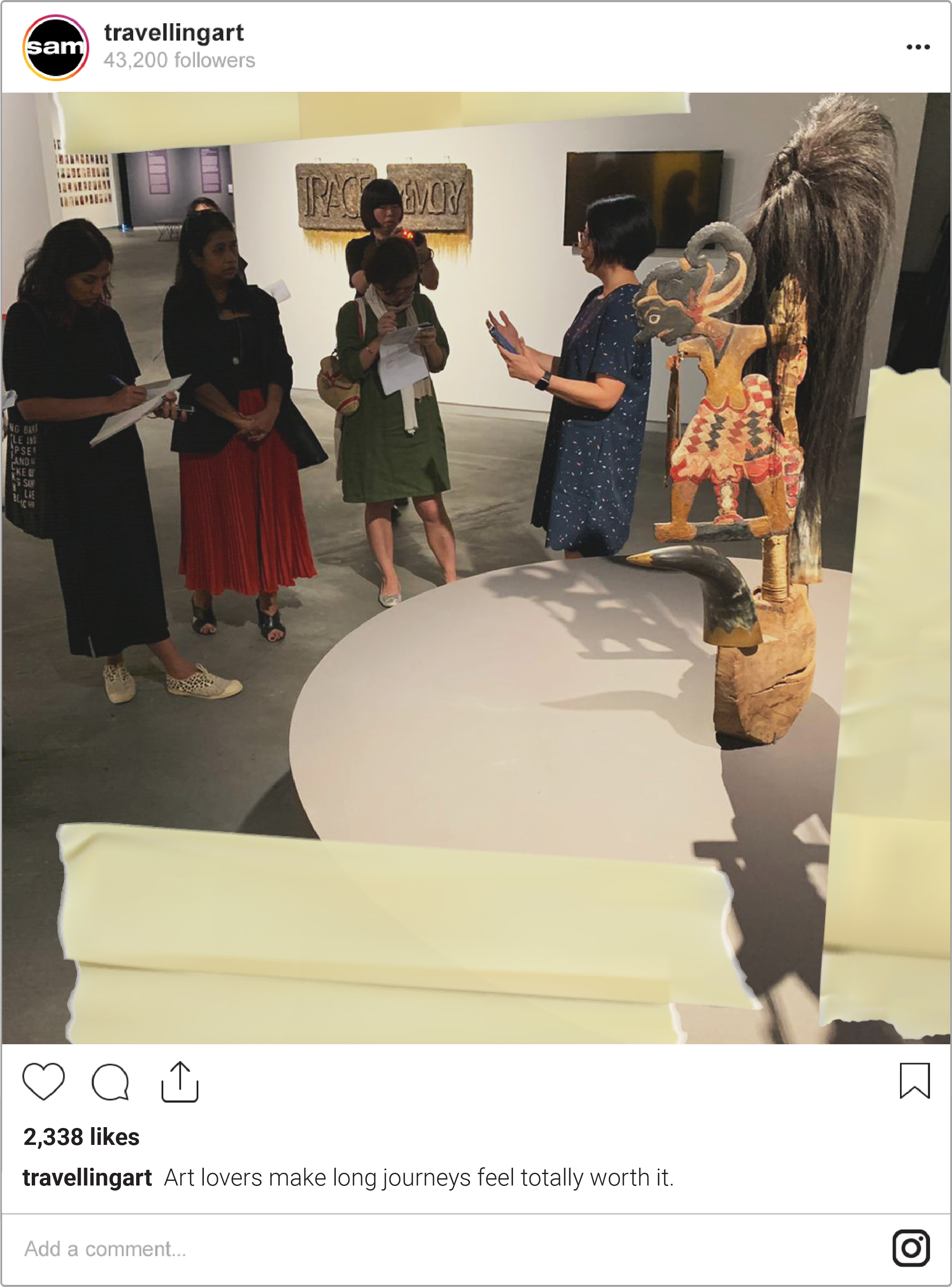 Visitors standing in front of the artwork 'The Voyage' by artist Mohammad Din Mohammad during a curator tour.