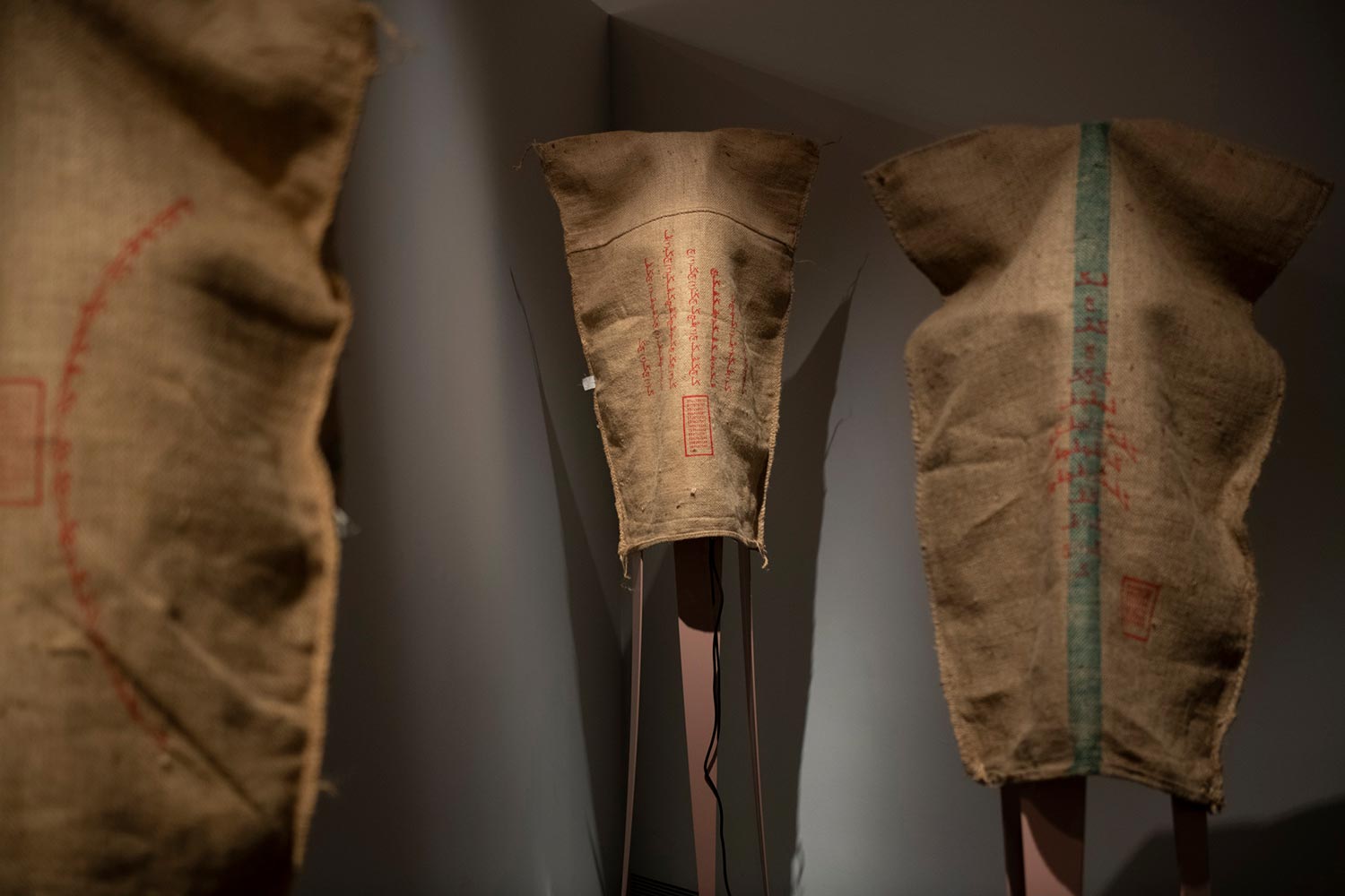 bani haykal. 'momok elektrik.' 2021. Nine-channel sound installation, gunny sacks, and steel frame documentation. Dimensions variable. Collection of Singapore Art Museum. Image courtesy of Singapore Art Museum.