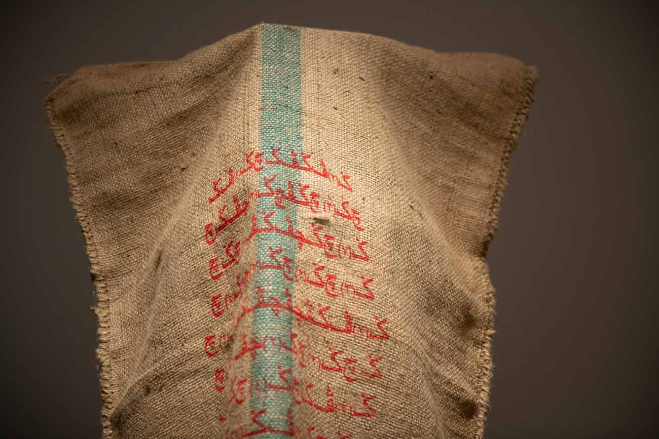bani haykal. 'momok elektrik.' 2021. Nine-channel sound installation, gunny sacks, and steel frame documentation. Dimensions variable. Collection of Singapore Art Museum. Image courtesy of Singapore Art Museum.