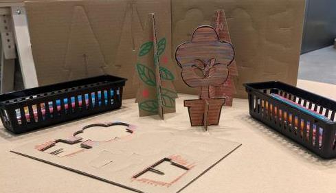 Examples of cardboard plant sculptures