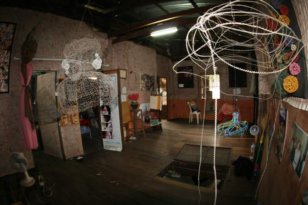 A view of 'Hut Tep Soda Chan' as it was first displayed inside the artist’s family home at Boeung Kak Lake, Phnom Penh, 2011. Image courtesy of Heinrich Böll Foundation.